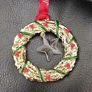 The ornament is from the "Hour of Power" brand and features a 2006 Nativity Baby